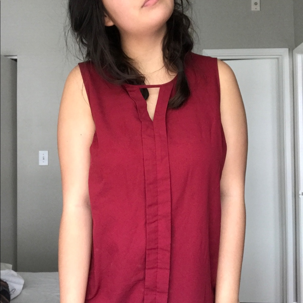 Red sleeveless blouse